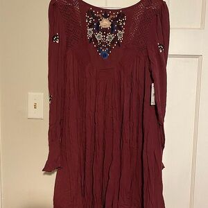Free People burgundy tunic blouse or dress. Brand new with tags. Never worn.